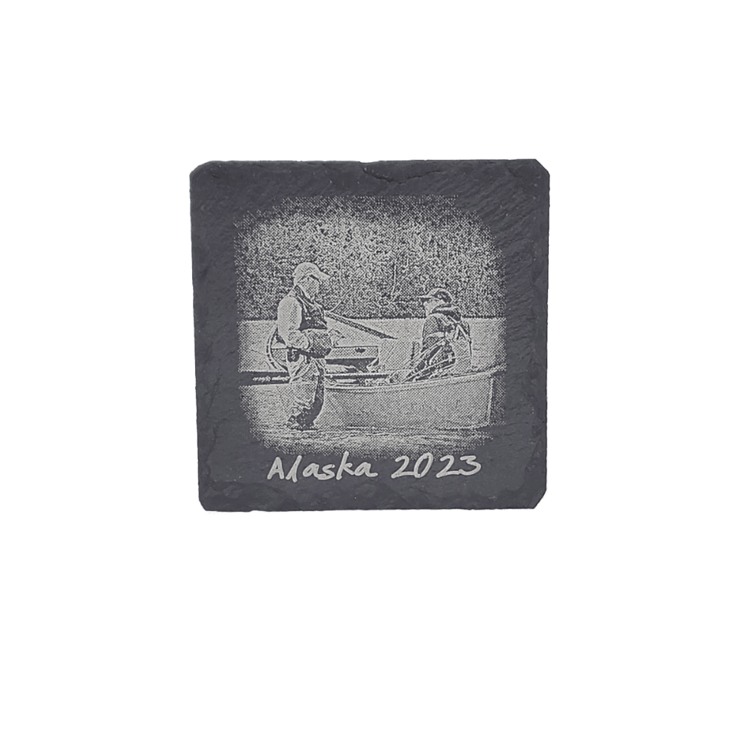 Laser engraved black slate tile.